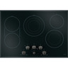 ACCESSORY-ELECTRIC-COOKTOP-KNOB-KIT-BRUSHED-BLACK-CXCE1HKPMBT-CAFE-INSTALLED.jpg_1200Wx1200H