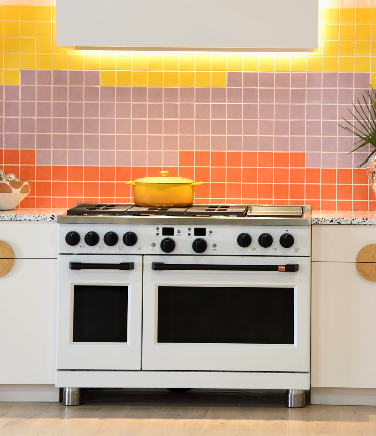 matte white 36 inch range with wood cabinets