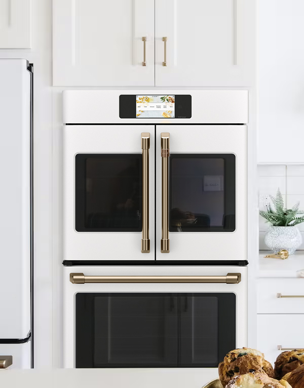 matte white french door double wall oven with white cabinets