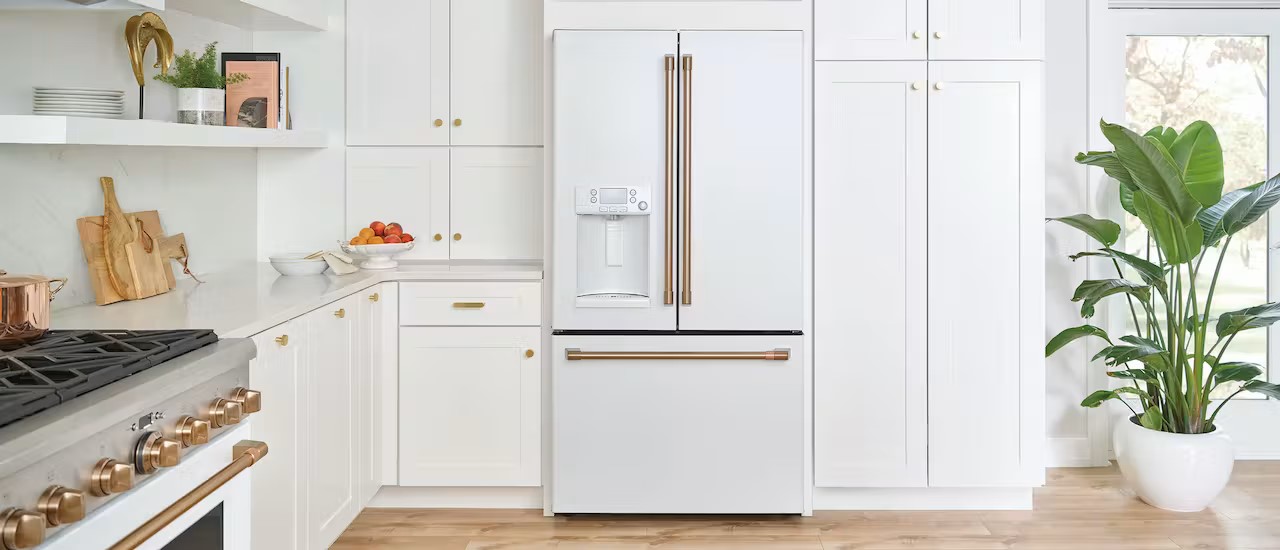 matte white cafe refrigerator in white cabinets