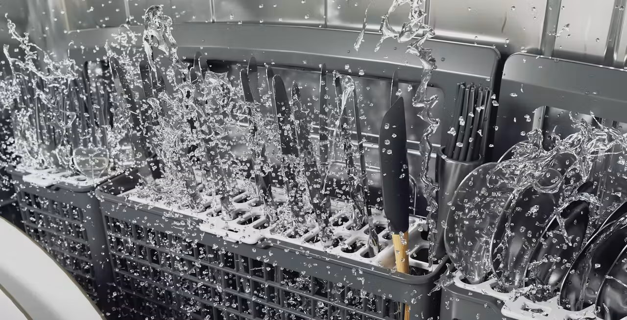 silverware holder inside dishwasher with water 